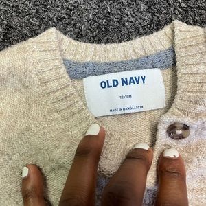 Old navy 18 month oatmeal pull over cardigan that’s never been worn.